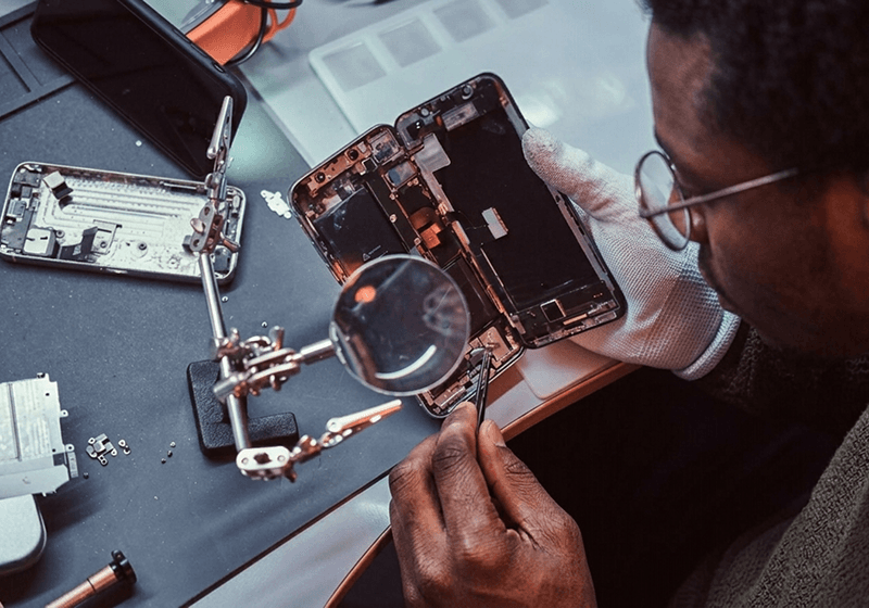 Samsung Galaxy technician inspecting a phone